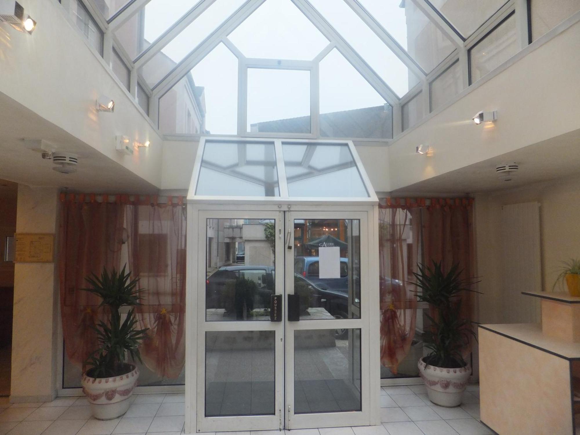Hotel Le Village Gif-sur-Yvette Bagian luar foto