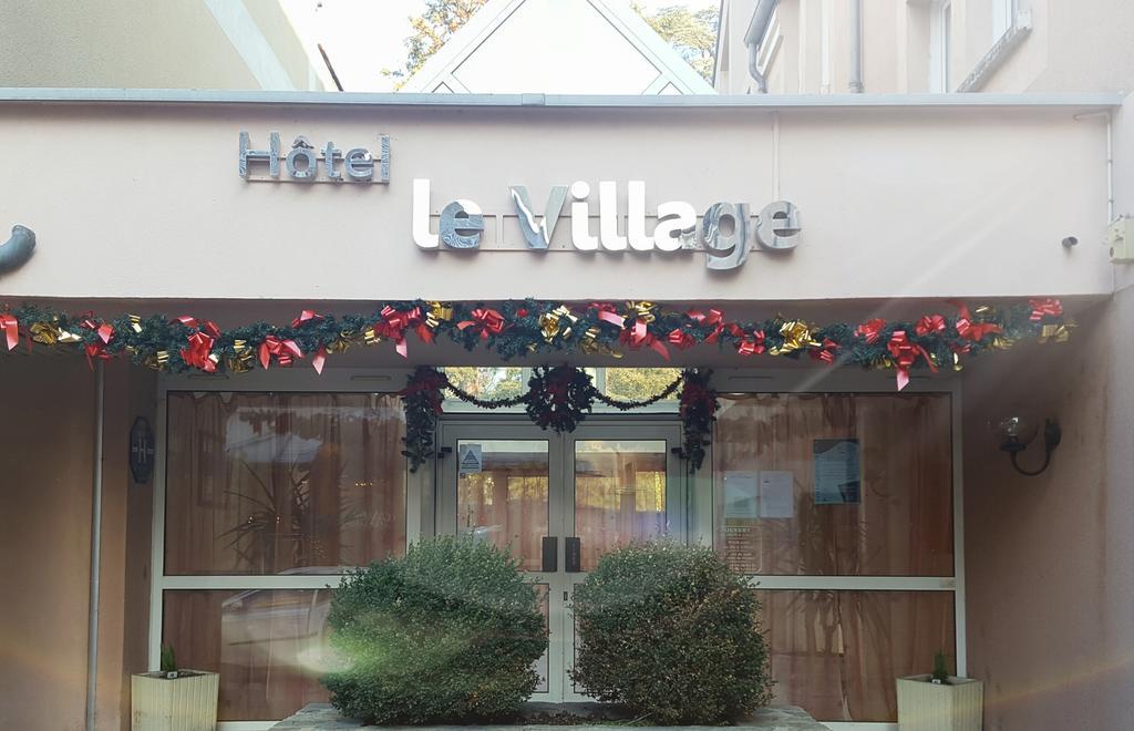 Hotel Le Village Gif-sur-Yvette Bagian luar foto